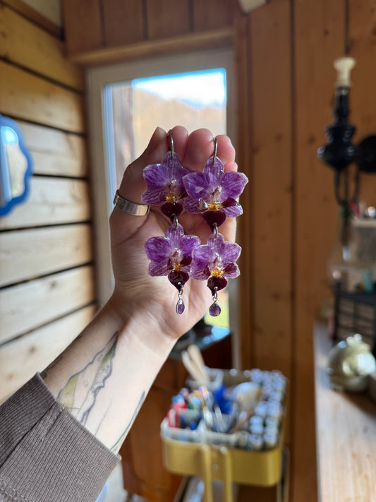 one and only exclusive orchid dangles