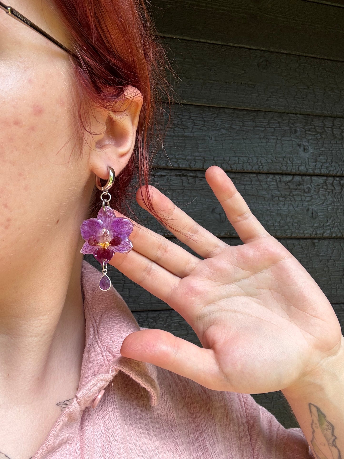 Orchid huggies with amethyst