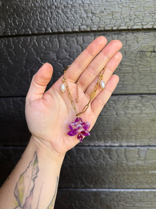 Orchid and pearl shell charm bracelet