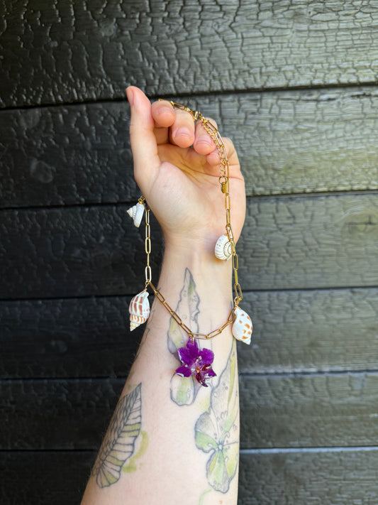 Orchid and shell charm necklace
