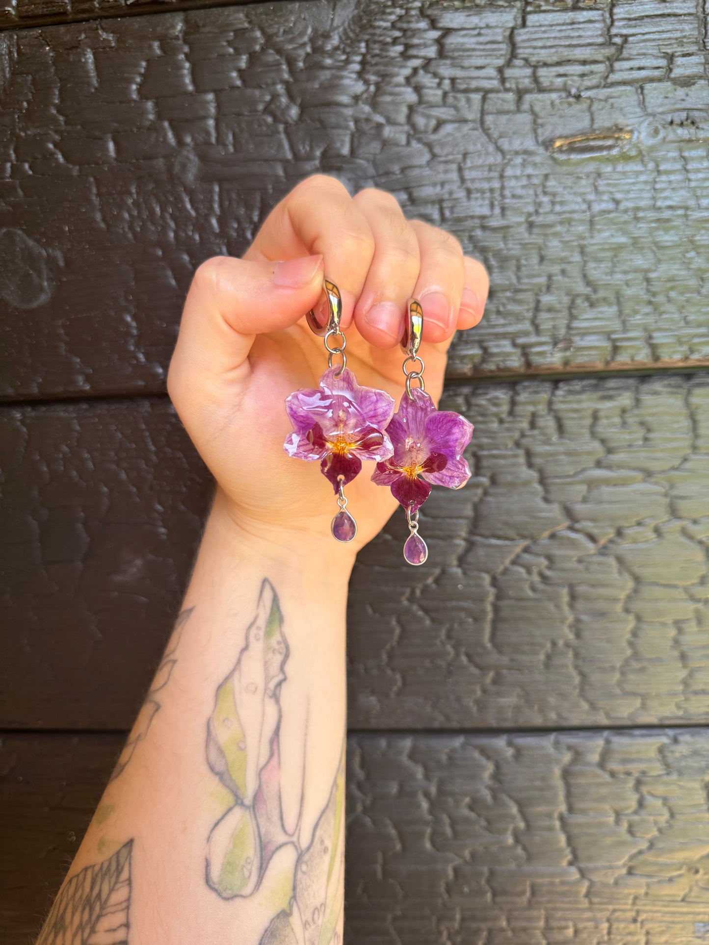 Orchid huggies with amethyst